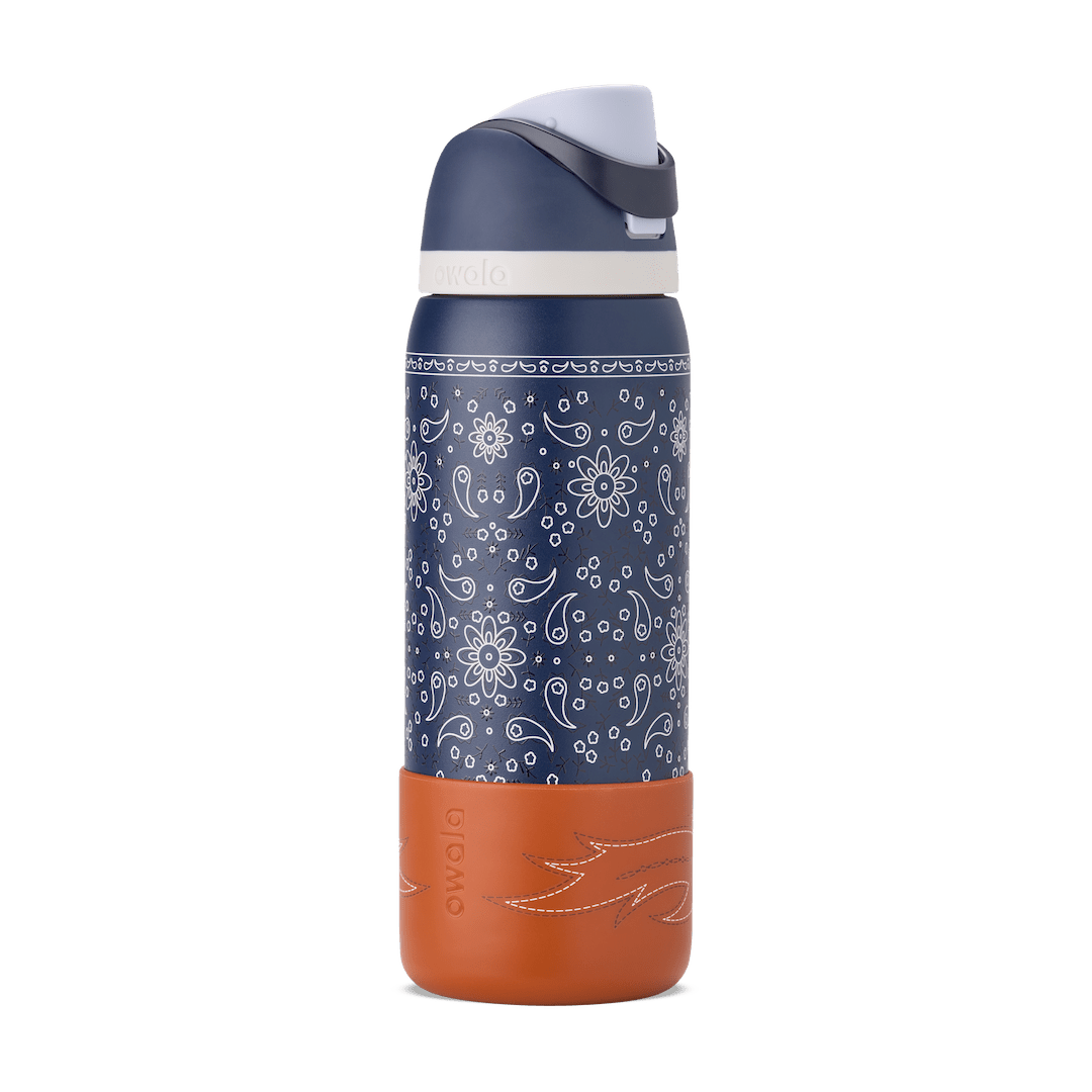 Blue insulated water bottle with white floral paisley pattern and brown leather sleeve