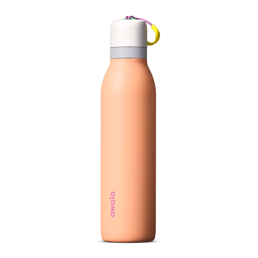 Peach-colored Owala 24oz insulated water bottle with white cap and colorful loop handle