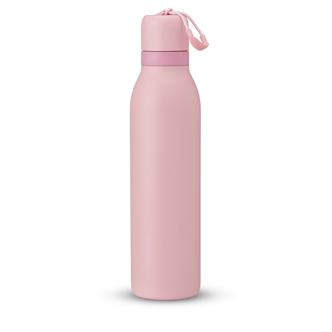 Matte pink insulated water bottle with a matching cap and silicone loop