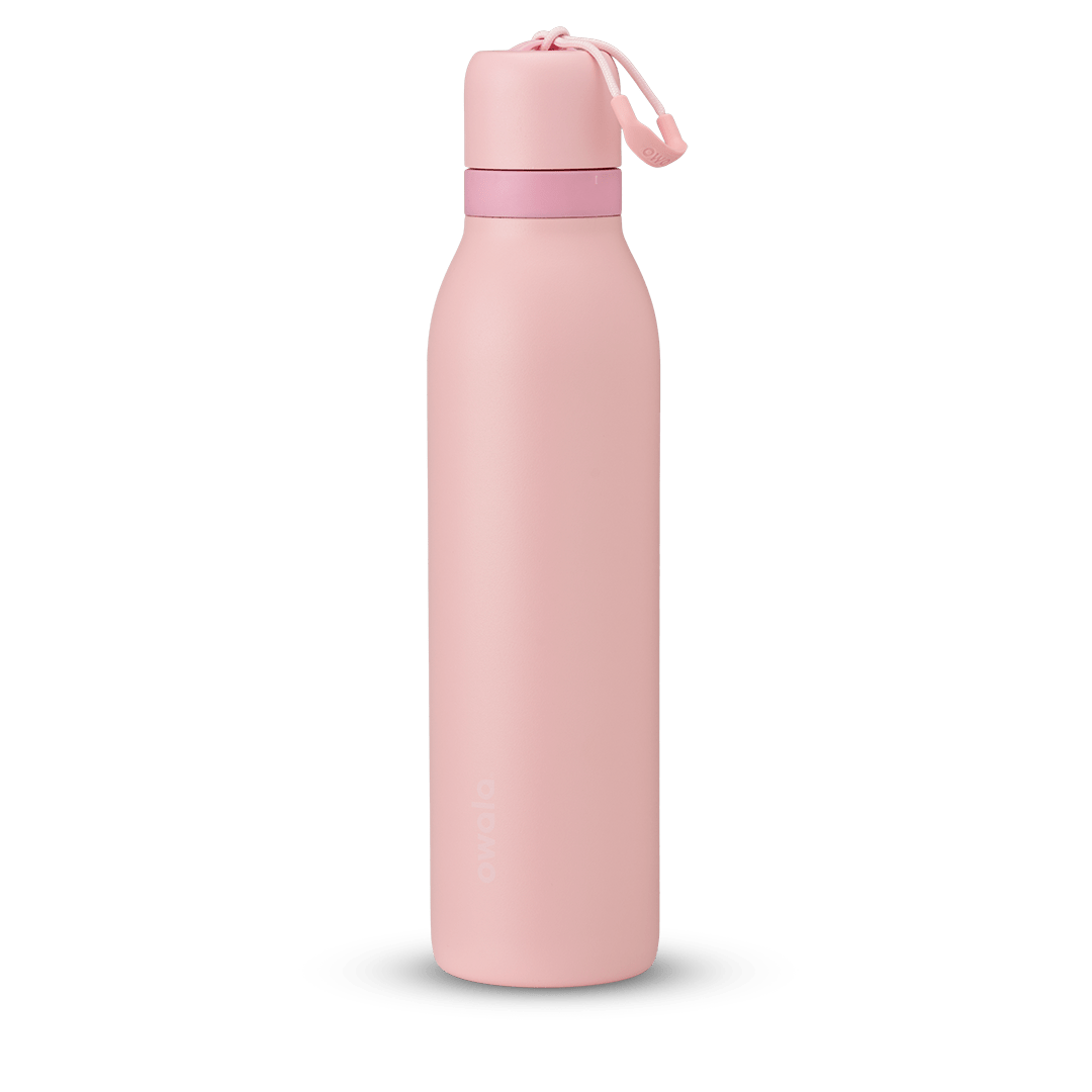 Sleek pink insulated water bottle with cap and carrying loop, minimalist design