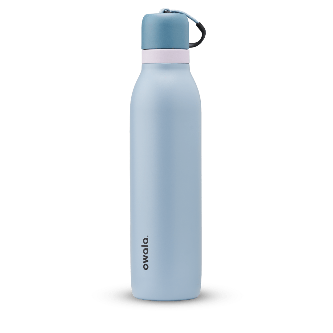 Light blue Owala stainless steel water bottle with pink accent and carrying loop cap